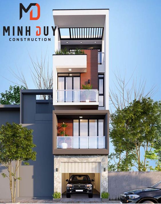 Hình ảnh một mẫu nhà phố hiện đại, mặt tiền đơn giản nhưng tinh tế, có giếng trời hoặc ban công cây xanh